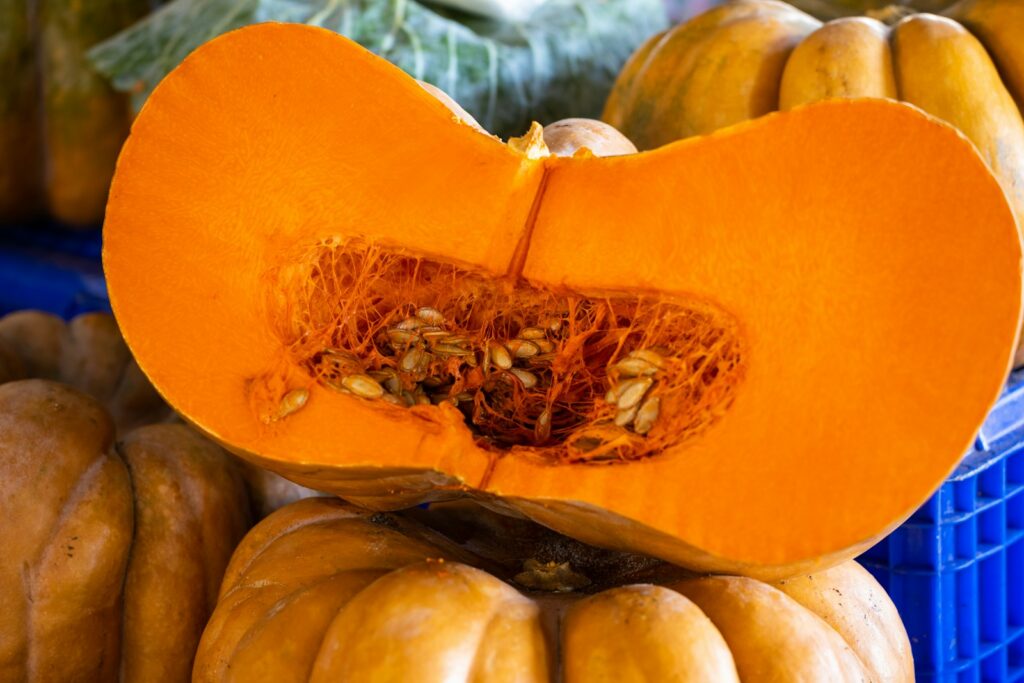 a close up of a pumpkin cut in half